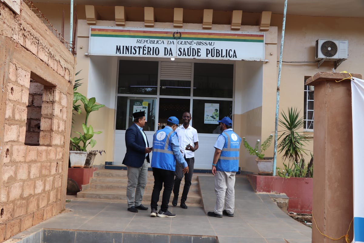 Humanity First team with the national director of public health