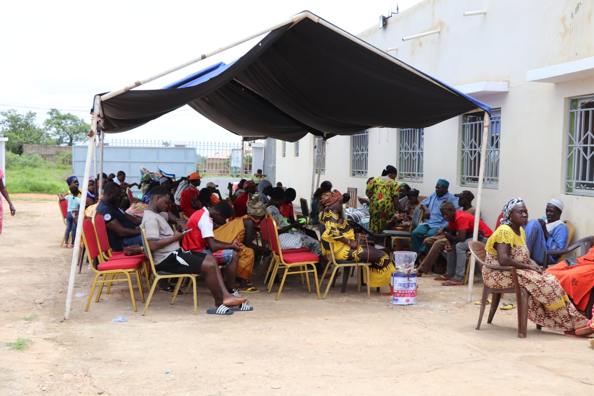 Doctors treating patients at the Humanity First medical clinic in Bissau