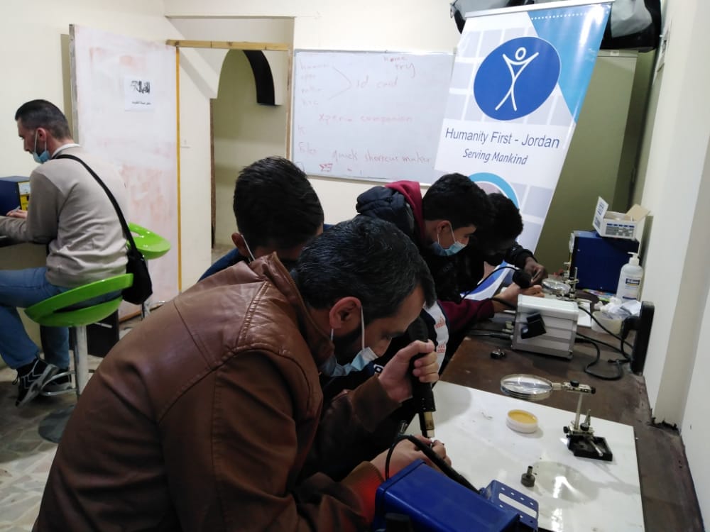 Mobile phone repair training for refugees in Jordan