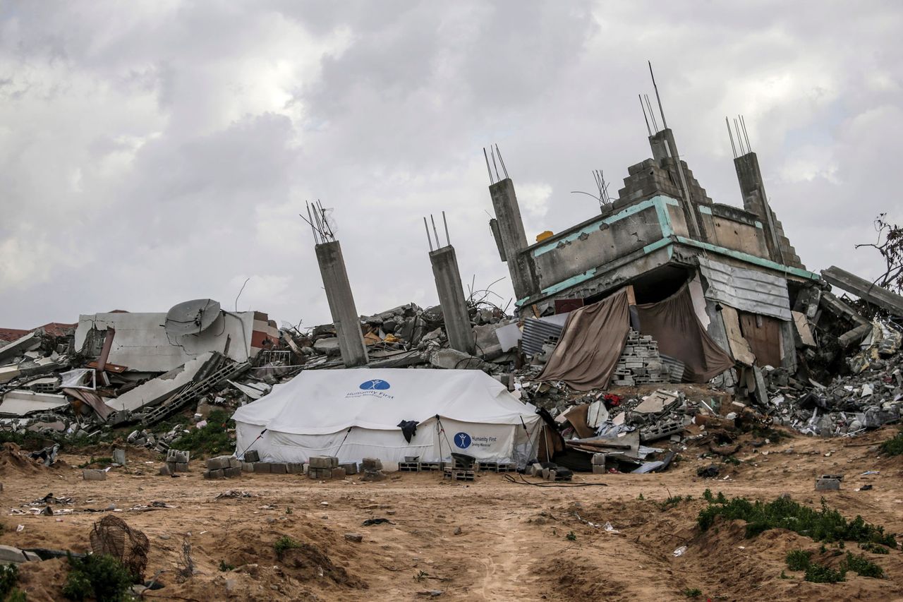 A family's tent amongst the rubble in Gaza