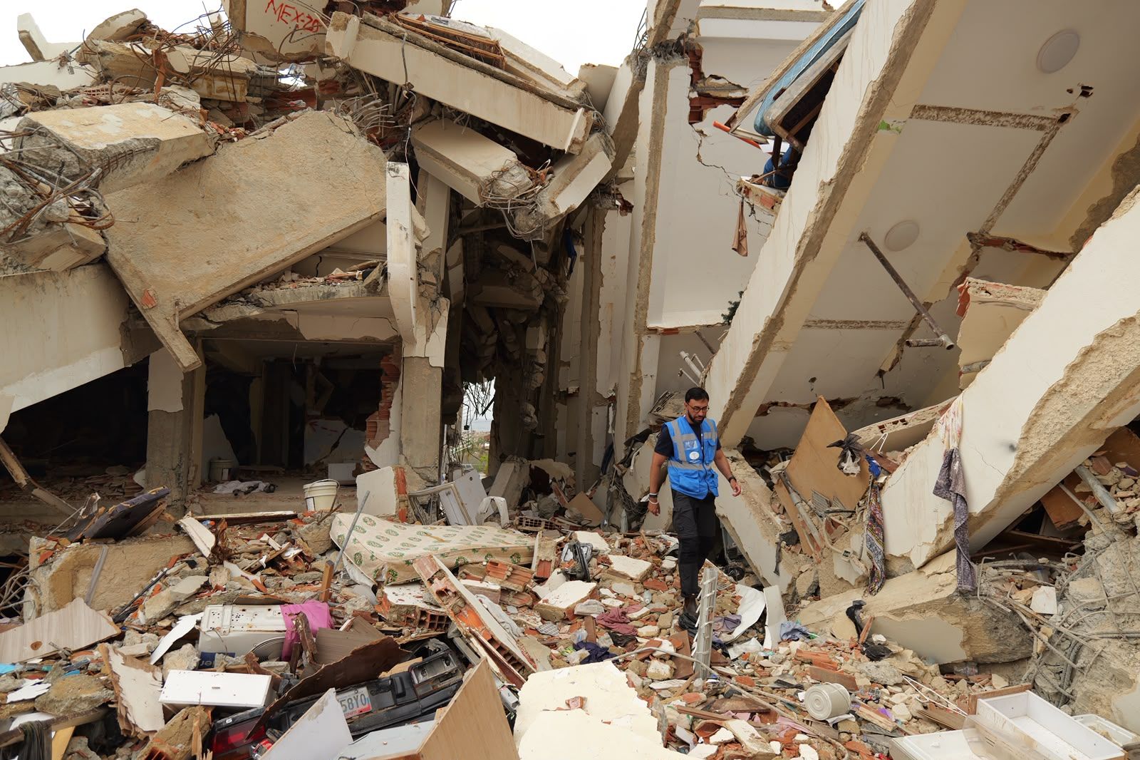 A Humanity First worker among collapsed buildings after the earthquake in Venezuela