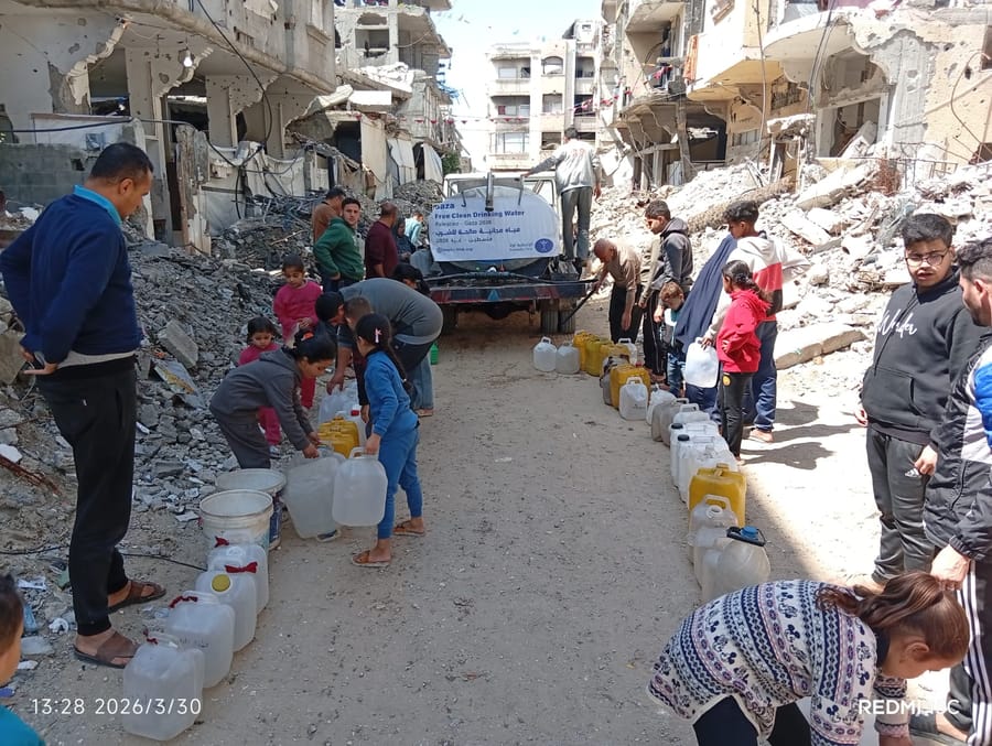 A Humanity First water tanker on a war-damaged street in Gaza